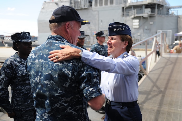 Cmdr. Stefan Walch, commanding officer of Arleigh Burke-class guided-missile destroyer USS Gonzalez (DDG 66) greets Gen. Lori Robinson, Commander North American Aerospace Defense Command and U.S. Northern Command Aug. 11, 2016. The General's visit to Norfolk includes a maritime domain awareness brief at the U.S. Fleet Forces Maritime Operations Center, a tour of Gonzalez and a hall of fame induction ceremony at the Joint Forces Staff College.