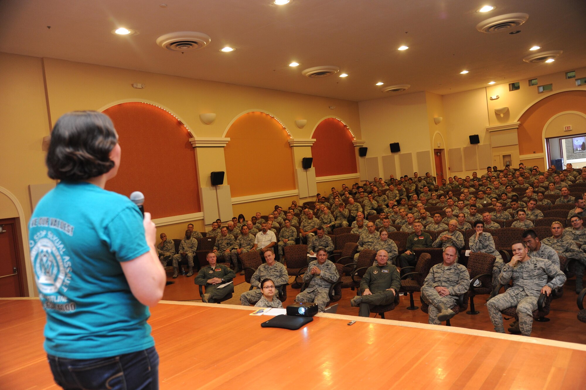 Staff Sgt. Allison Mott, 940th Air Refueling Wing Sexual Assault Prevention and Response victim's advocate  addresses Beale Citizen Airmen during a Commander's Call at Beale Air Force Base, California on August 7, 2016. Mott discussed the important steps and options Citizen Airmen can take if they were ever to be in a situation where they would need to report a crime of sexual harassment or assault. (U.S. Air Force photo by Tech. Sgt. Heather Skinkle)