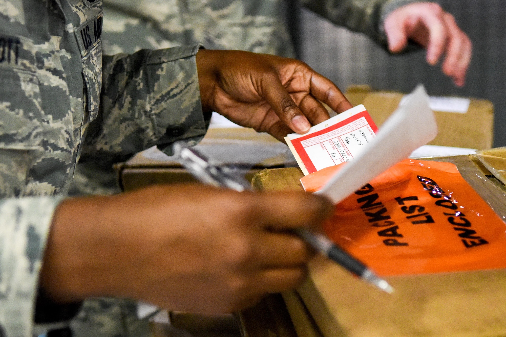 Tech. Sgt. Jewel Stott, 4th LRS NCO in-charge of Centralized Repair Facility, checks in maintenance parts from the 4th Component Maintenance Squadron back shop into the CRF, Aug. 3, 2016, at Seymour Johnson Air Force Base, North Carolina. After parts are checked-in they are entered into the Execution and Prioritization of Repair Support System which is a computer database that allows other installations to search for parts. (U.S. Air Force photo by Airman Shawna L. Keyes)