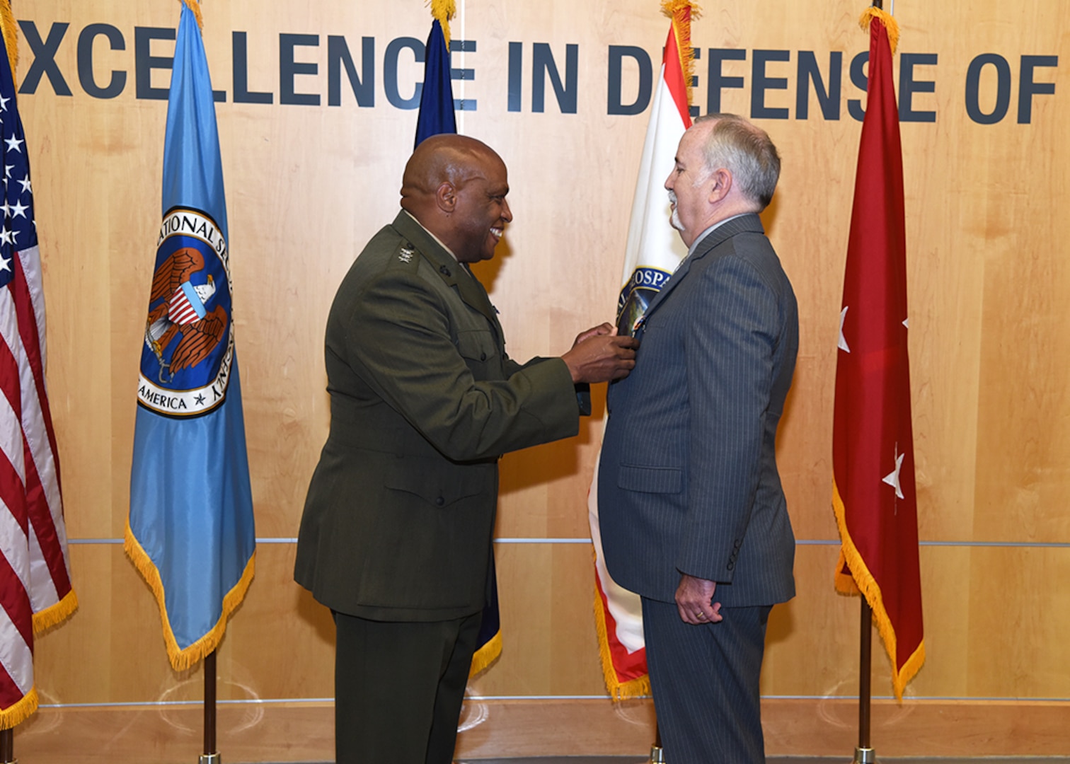 DIA Director Lt. Gen. Vincent Stewart awarded former deputy director, Doug Wise, the Defense Intelligence Director’s Award during Wise’s retirement ceremony at DIA Headquarters Aug. 11. 