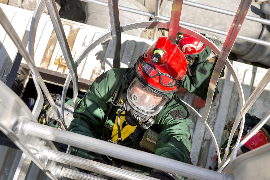 Army Spc. Joe S. Carson climbs the staircase to a tower in the rubble pile to prepare for a search and extraction exercise after a simulated chemical attack during a joint exercise evaluation at Camp Rilea in Warrenton, Ore., Aug. 2, 2016. Carson is a maintenance mechanic assigned to the Colorado National Guard’s 365th Maintenance Company. Air National Guard photo by Staff Sgt. Bobbie Reynolds