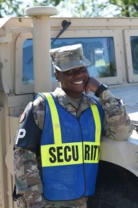 Army Reserve Pvt. Bianca Simpson, Human Resources Specialist, pauses for a photo during a rotation with soldiers as gate security during the 85th Support Command's Battle Assembly on Aug. 7, 2016.
(Photo by Spc. David Lietz)