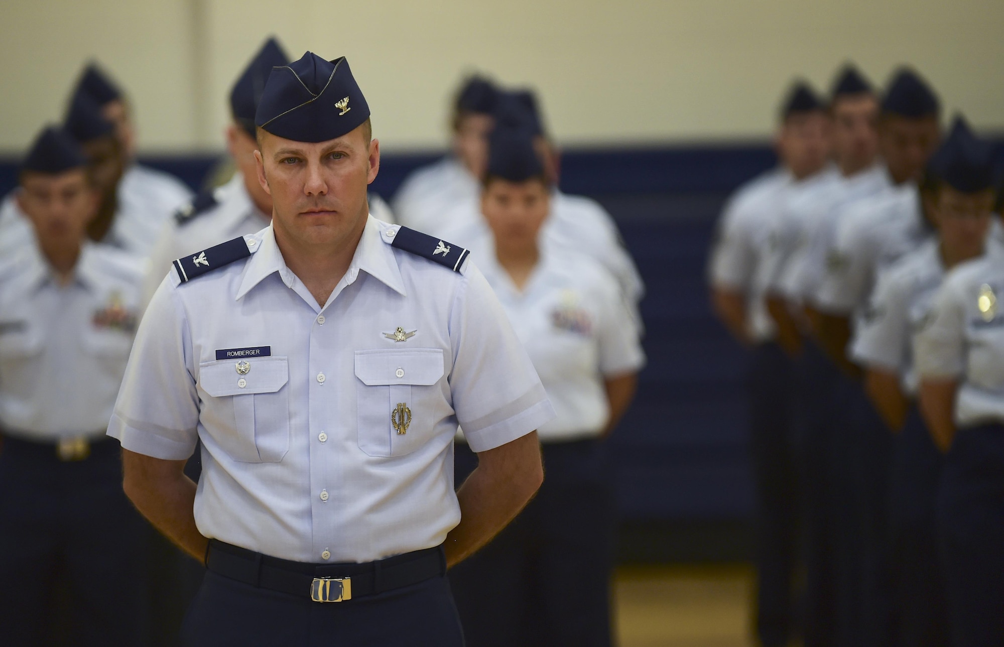 Col. Scott Romberger, 460th Space Wing vice commander, presents the wing August 12, 2016, during the wing’s change of command ceremony at the Buckley Fitness Center on Buckley Air Force Base, Colo. Buckley AFB defends America through its air operations, space-based missile warning capabilities, space surveillance operations, space communications operations and support functions. (U.S. Air Force photo by Airman 1st Class Gabrielle Spradling/Released)