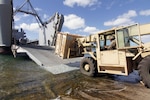 Soldiers from 325th Brigade Support Battalion, 25th Infantry Division, load cargo and military vehicles on board the 8th Theater Sustainment Command's Logistic Support Vessel-2, the U.S. Army Vessel CW3 Harold A. Clinger at Ford Island, Aug. 10, 2016, in preparation for Pacific Pathway 16.3.  

