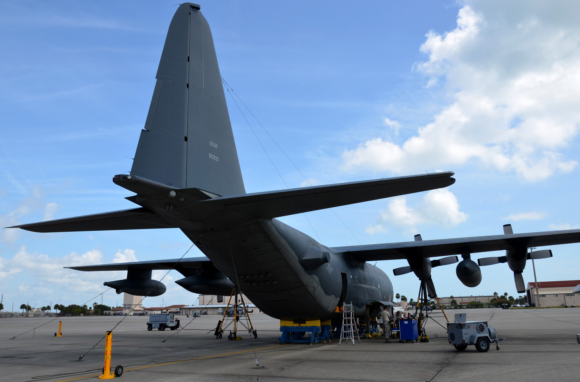Two maintenance squadrons from the 920th Rescue Wing, Patrick Air Force Base Florida, teamed up to work on a HC-130P/N refueling aircraft, to replace its struts August 2. (U.S. Air Force Photo approved/released by Senior Airman Brandon P. Kalloo Sanes)