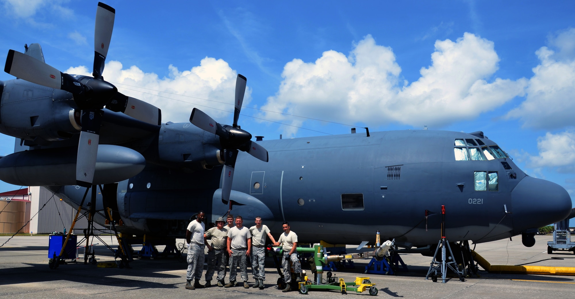 Two maintenance squadrons from the 920th Rescue Wing, Patrick Air Force Base Florida, teamed up to work on a HC-130P/N refueling aircraft, to replace its struts August 2. (U.S. Air Force Photo approved/released by Senior Airman Brandon P. Kalloo Sanes)
