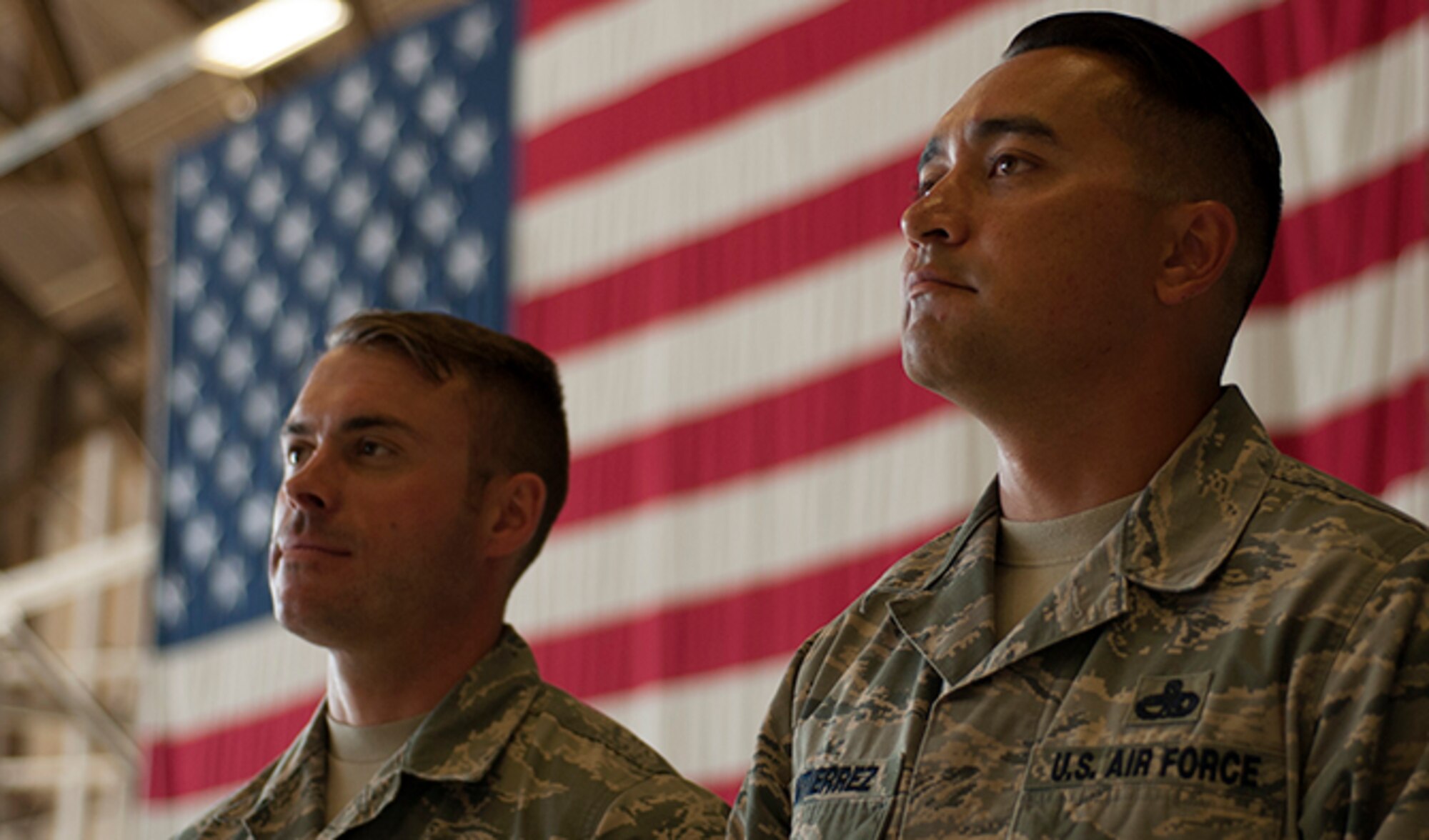 Staff Sgt. Robert Goodman, 92nd Maintenance Group Aircraft General flying crew chief and Master Sgt. Dominik Gutierrez, 92nd MXG Aircraft General flight line expediter, line up during an interview after winning the Fairchild MXG Olympic Relay Competition Aug. 5, 2016, at Fairchild Air Force Base, Wash. Team 5 won out over seven other teams, winning by a margin of only a few seconds. (U.S. Air Force photo/ Airman 1st Class Ryan Lackey)