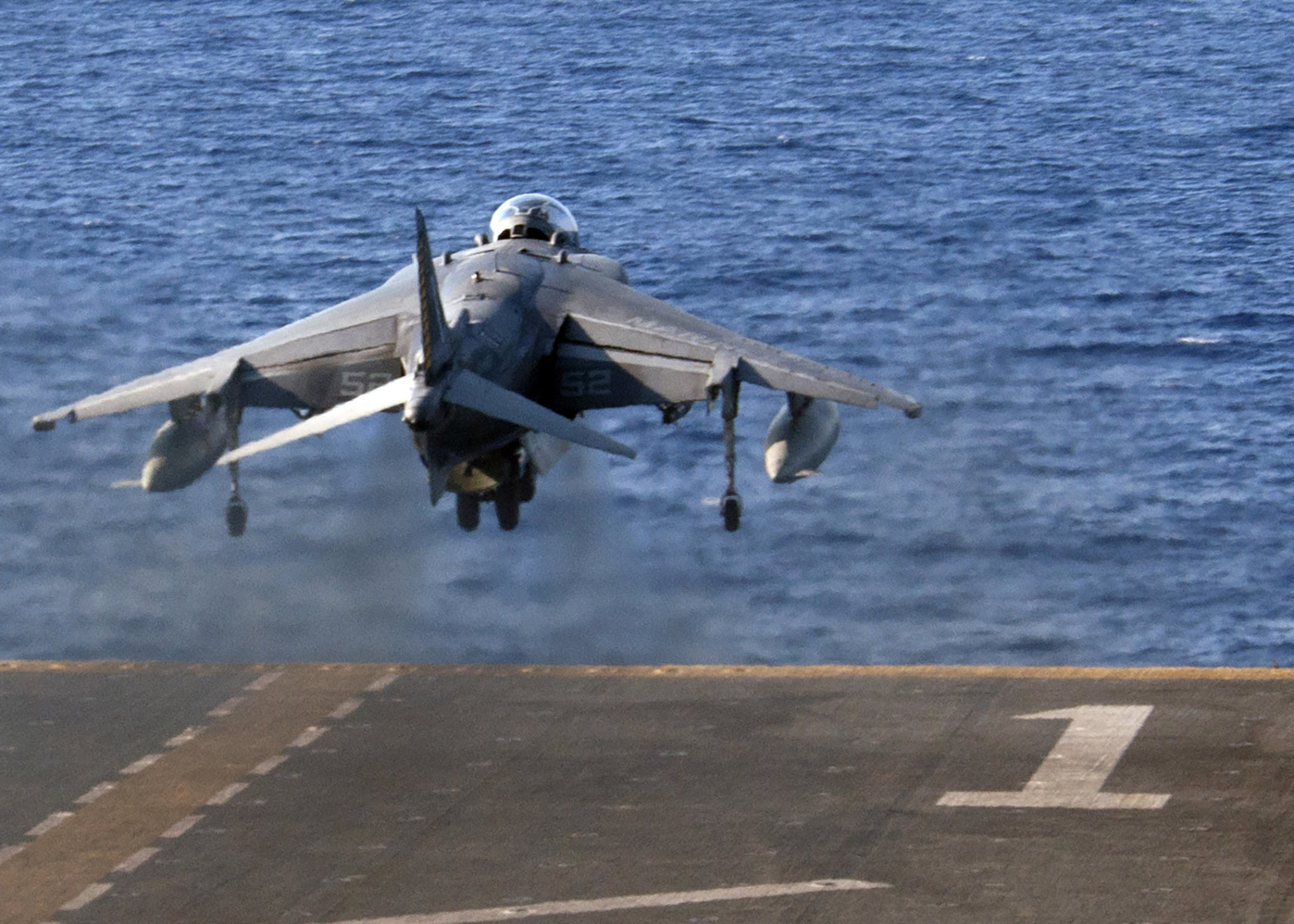 An AV-8B Harrier assigned to the 22nd Marine Expeditionary Unit takes off from the flight deck of the amphibious assault ship USS Wasp in the Mediterranean Sea, Aug. 10, 2016. The 22nd MEU, embarked on Wasp, is conducting precision air strikes in support of the Libyan Government of National Accord-aligned forces against ISIL targets in Sirte, Libya, as part of Operation Odyssey Lightning. Navy photo by Petty Officer 3rd Class Rawad Madanat -