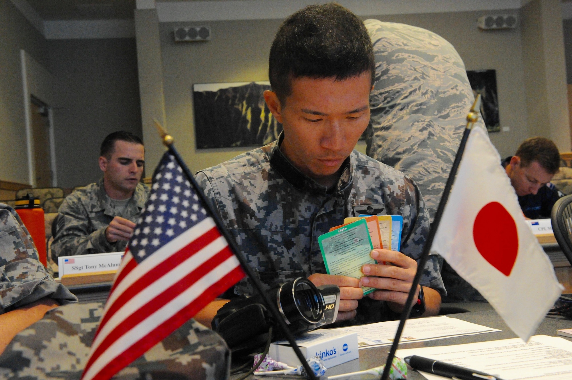 Tech. Sgt. Yuki Kawagoe, a pararescue jumper with the Japan Air Self-Defense Force, Akita Air Station, Air Rescue Wing, Japan, completes the "True Colors" self-assessment during the first U.S. led, Pacific Rim Junior Enlisted Leadership Forum (JELF) at Joint Base Pearl Harbor-Hickam, Hawaii, Aug 8. 2016. The JASDF represented one of the 11 different countries that came together to share experiences and to gain valuable insight on leadership, further developing U.S. alliances and partnerships across the Pacific.  (U.S. Air Force photo by Staff Sgt. Kamaile Chan)