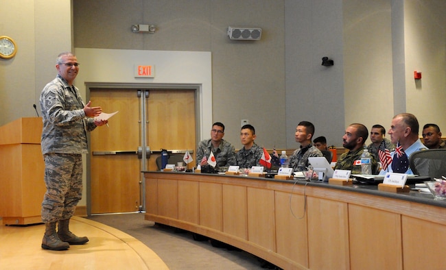 U.S. Air Force Chief Master Sgt. Timothy Horn, the Air University command chief master sergeant at Maxwell Air Force Base, Ala., briefs service members during the first U.S. led, Pacific Rim Junior Enlisted Leadership Forum (JELF) at Joint Base Pearl Harbor-Hickam, Hawaii, Aug 8. 2016. The participants came together from 11 different countries to share experiences and to gain valuable insight on leadership development in order to grow as tomorrow's senior enlisted leaders.  (U.S. Air Force photo by Staff Sgt. Kamaile Chan)