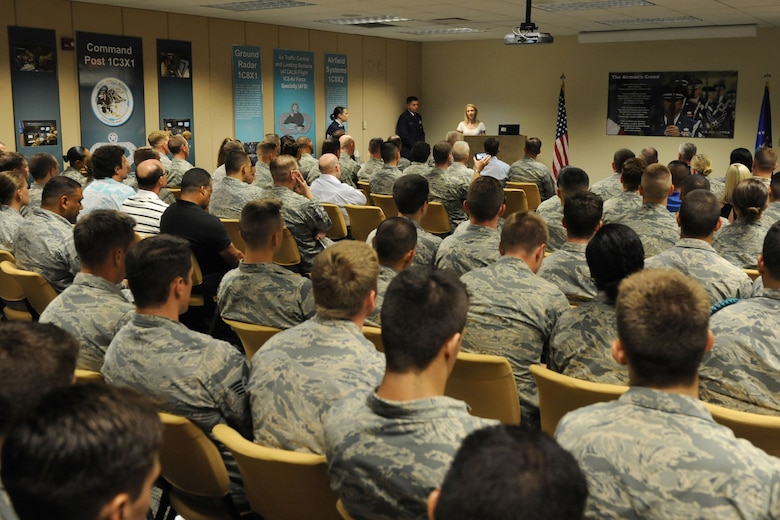 Heather Gray Blalock delivers remarks during a dedication ceremony at Cody Hall to honor her late husband, Maj. W. David Gray, Aug. 8, 2016, on Keesler Air Force Base, Miss. Gray served for several years as an airfield operations officer and was killed in action in Afghanistan on Aug. 8, 2012. A tower lab training room was dedicated during the event. (U.S. Air Force photo by Kemberly Groue/Released)