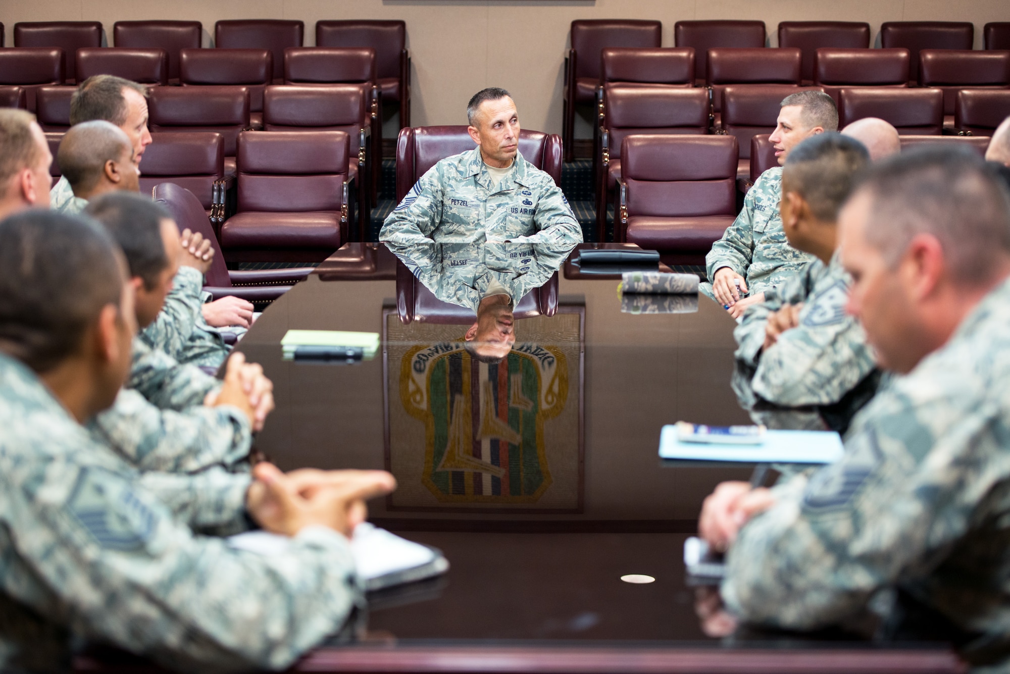 U.S. Air Force Chief Master Sgt. Todd Petzel, 18th Air Force command chief, Scott Air Force Base, Ill., visits the First Sergeants Council at Travis Air Force Base, Calif., Aug. 12, 2016. Petzel visited Travis AFB to provide remarks as the guest speaker for the Senior Non-Commissioned Officer Induction ceremony. (U.S. Air Force Photo by Louis Briscese)