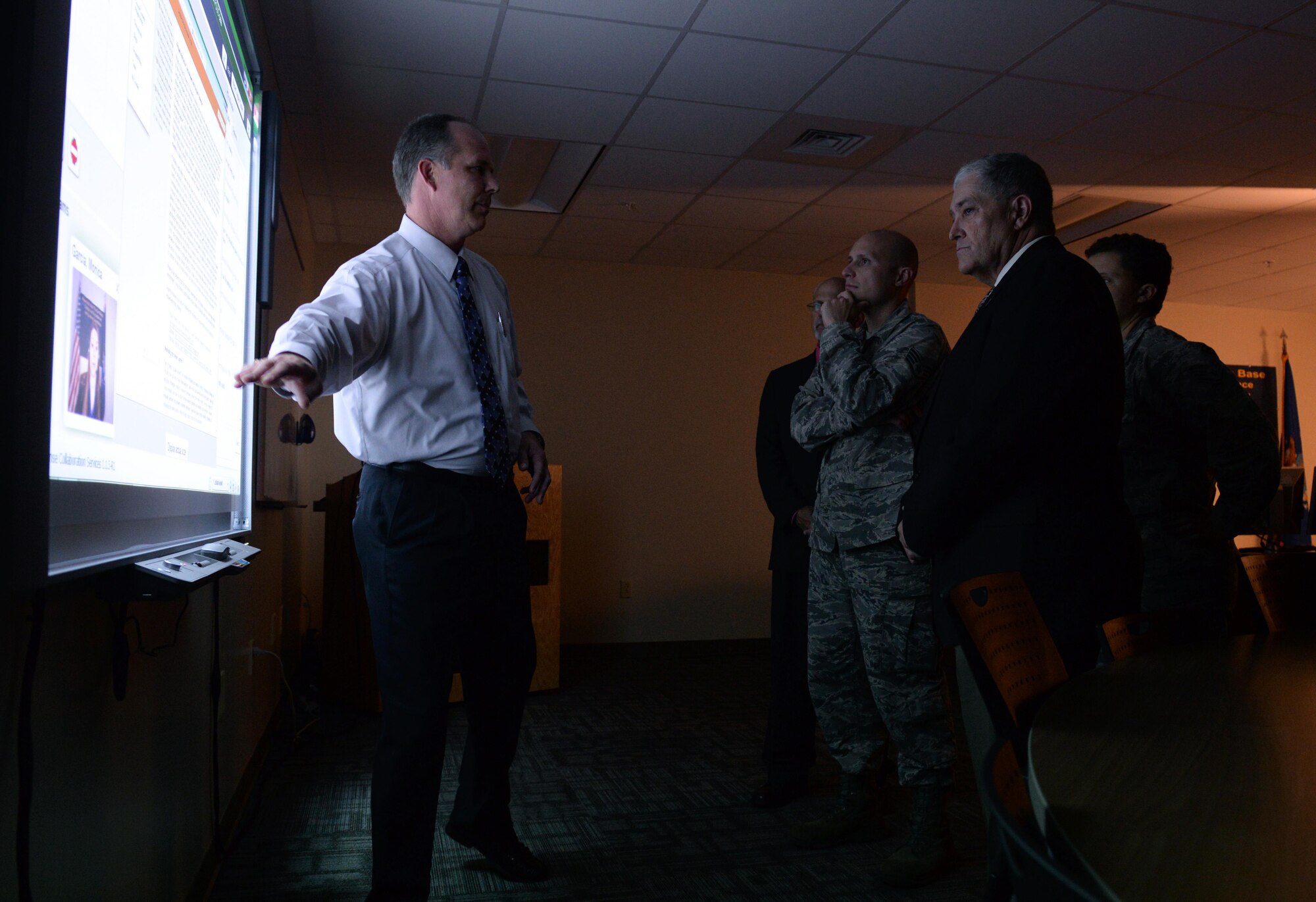 Rick Harman, 81st Training Support Squadron curriculum development manager, demonstrates the online learning broadcast studio’s capabilities to members of the Community College of the Air Force inspection team at Allee Hall Aug, 9, 2016, on Keesler Air Force Base, Miss. The CCAF inspection team visited the 81st Training Group to assess class curriculums to ensure Keesler maintains its accreditation so students can receive college credits for their completed technical schools. (U.S. Air Force photo by Airman 1st Class Travis Beihl/Released)