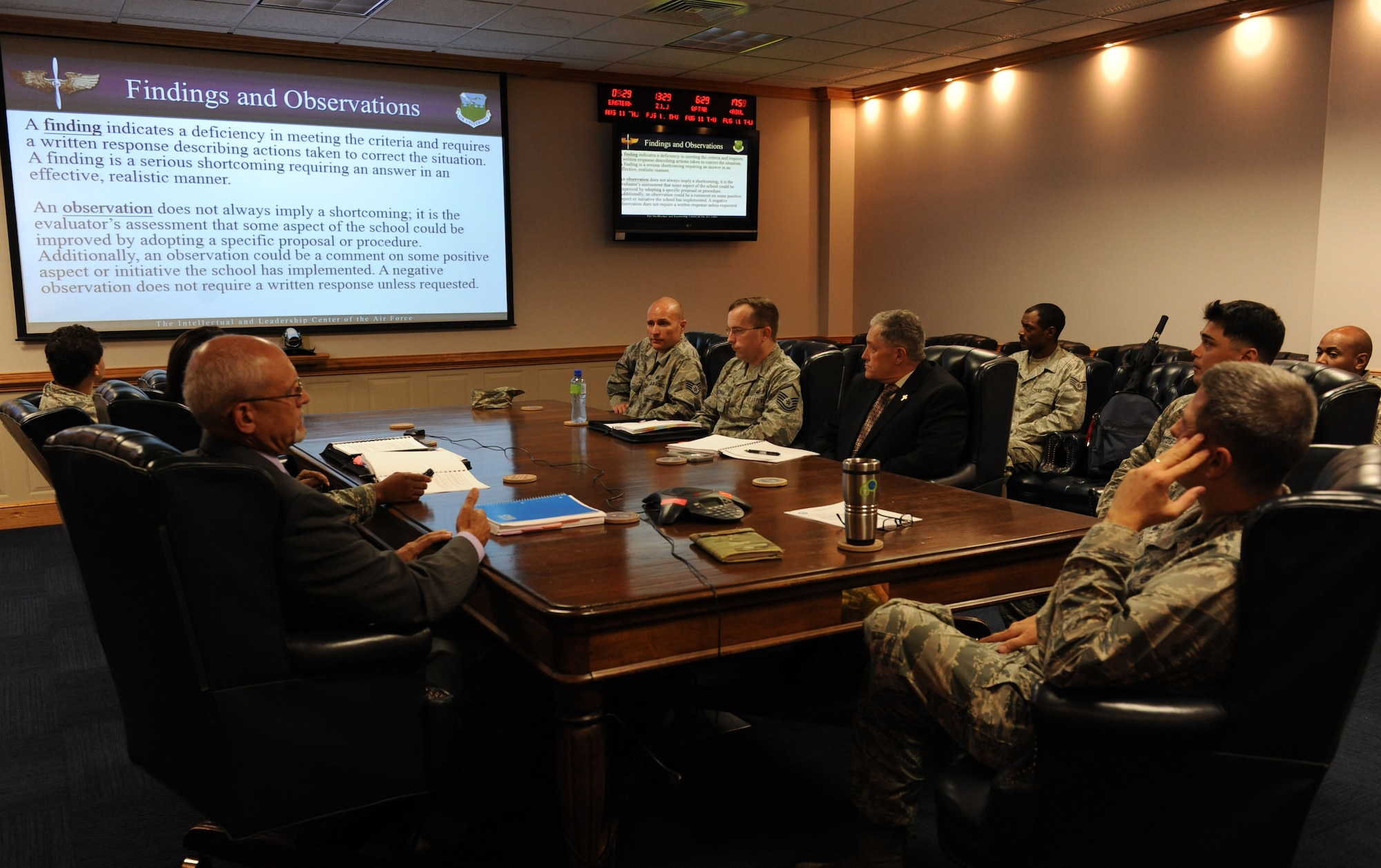 Members of the Community College of the Air Force inspection team provide an in-brief to members of the 85th Engineering Installation Squadron at Maltby Hall Aug. 11, 2016, on Keesler Air Force Base, Miss. The CCAF inspection team visited the 81st Training Group to assess class curriculums to ensure Keesler maintains its accreditation so students can receive college credits for their completed technical schools. (U.S. Air Force photo by Kemberly Groue/Released)