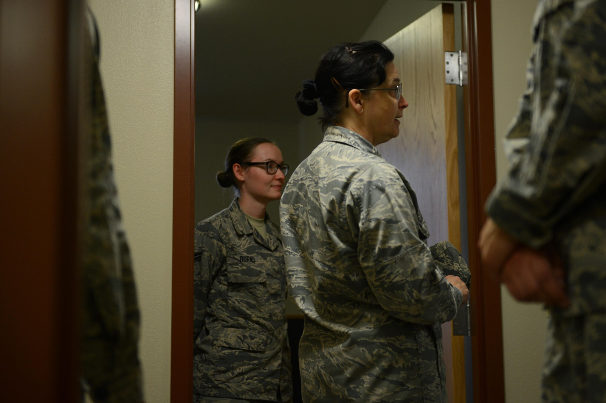 Air Force Col. Tambra Yates, 673d Medical Group commander, tours the rooms of MDG Airmen at the Warrior Transition Unit, at Joint Base Elmendorf-Richardson, Alaska, Aug. 12, 2016. By occupying the available space at the WTU, the Air Force will save more than $900,000 by not having to pay full BAH to Airmen. (U.S. Air Force photo by Airman 1st Class Javier Alvarez)
