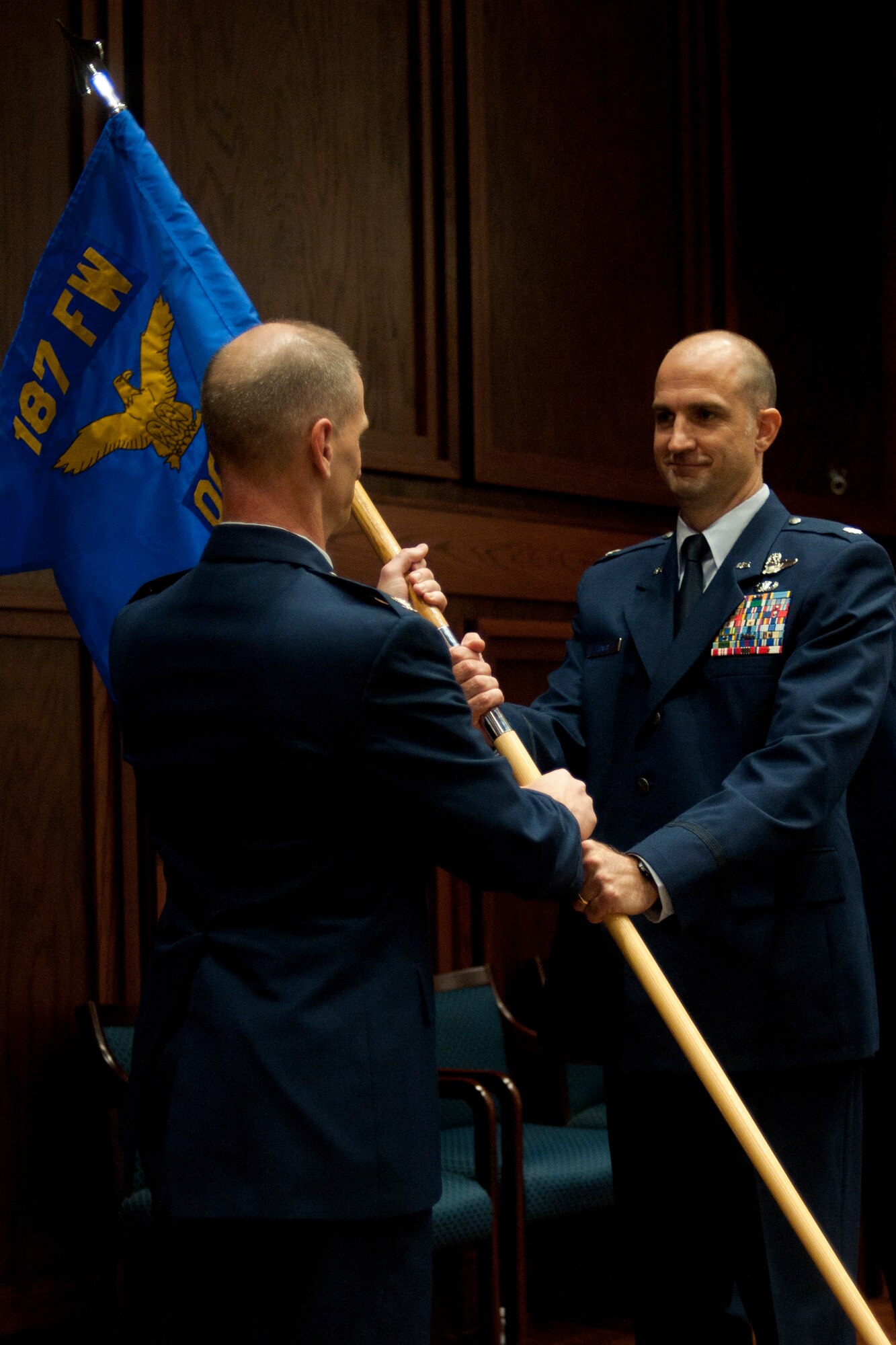U.S. Air Force Lt. Col. Christopher “Fatty” Jones, 187th Operations Group commander, accepts command of the 187th OG Aug. 7, 2016, at the OG Change of Command at Montgomery Regional Air National Guard Base, Ala. (U.S. Air National Guard photo by Staff Sgt. Jared Rand)