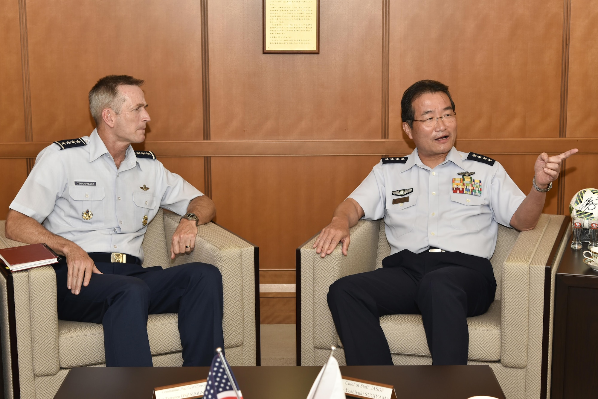 Gen. Terrence O’Shaughnessy, Pacific Air Forces commander, talks with Gen. Yoshiyuki Sugiyama, Japan Air Self-Defense Force chief of staff, at the Ministry of Defense in Tokyo, Japan, Aug. 8, 2016, during his immersion tour of the Indo-Asia Pacific Region. For the first time since taking command of PACAF, O’Shaughnessy visited the ADC, U.S. Embassy and Japan’s Ministry of Defense, along with a number of facilities at Yokota Air Base. (U.S. Air Force photo by Staff Sgt. Michael Washburn/Released)
