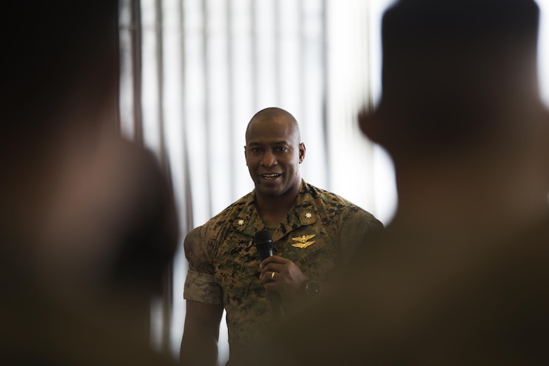 U.S. Marine Corps Lt. Col. Jabari Reneau, commanding officer of Marine All-Weather Fighter Attack Squadron (VMFA)-242, speaks about the outbound and incoming sergeants major at Marine Corps Air Station Iwakuni, Japan, Aug. 12, 2016. Reneau honored the ceremony in seeing off Sgt. Maj. Jason L. Kappen, outbound sergeant major of VMFA(AW)-242 and welcoming Sgt. Maj. James L. Shadle. (U.S. Marine Corps photo by Lance Cpl. Joseph Abrego)
