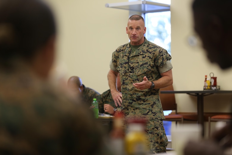 Sgt. Maj. Richard Thresher shares a few words with Marines attending the Marine Air Control Group 28's Corporals Course after sharing a meal with them at the mess hall aboard Marine Corps Air Station Cherry Point, N.C., Aug. 9, 2016. Thresher and Brig. Gen. Matthew Glavy had breakfast with the Marines while discussing leadership and the role of noncommissioned officers in mission accomplishment for the Marine Corps. Thresher is the command sergeant major and Glavy is the commanding general for 2nd Marine Aircraft Wing. (U.S. Marine Corps photo by Lance Cpl. Mackenzie Gibson/Released)