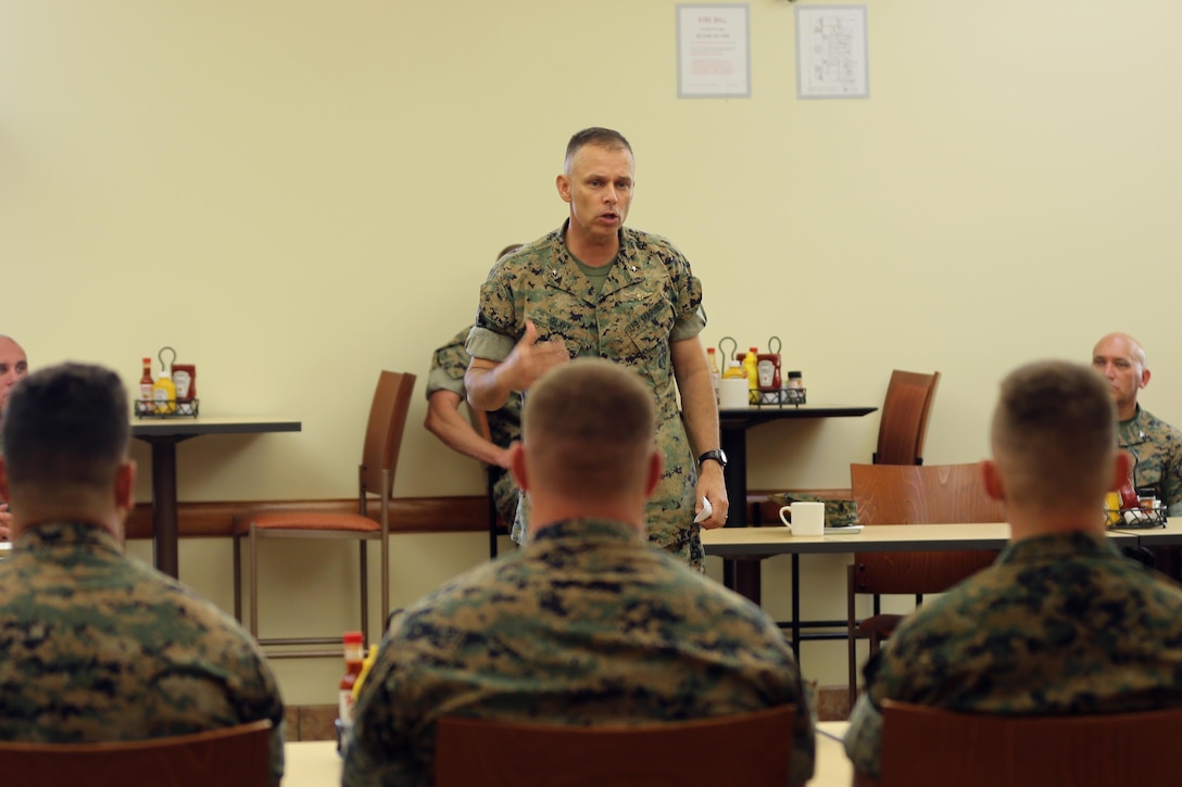 Brig. Gen. Matthew Glavy shares a few words with Marines assigned to Marine Air Control Group 28's Corporals Course after sharing a meal at the mess hall aboard Marine Corps Air Station Cherry Point, N.C., Aug. 9, 2016. Glavy and Sgt. Maj. Richard Thresher had breakfast with the Marines while discussing leadership and the role of noncommissioned officers in mission accomplishment for the Marine Corps. Glavy is the commanding general and Thresher is the command sergeant major for 2nd Marine Aircraft Wing. (U.S. Marine Corps photo by Lance Cpl. Mackenzie Gibson/Released)