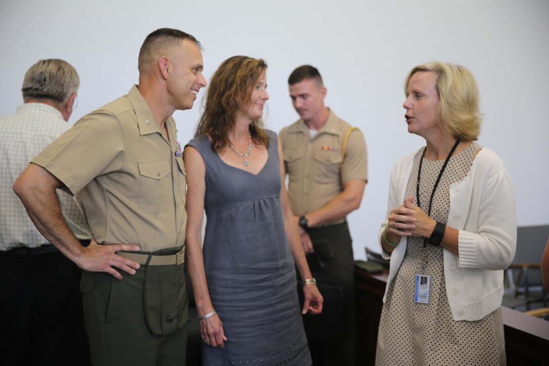 Brig. Gen. Matthew Glavy (left) and his wife, Francine, converse with Meghan Doyle, superintendent of Craven County (right), during a meet-and-greet at the City Hall in Havelock, N.C., Aug. 9, 2016. Col. Todd Ferry, commanding officer for Marine Corps Air Station Cherry Point, also attended as a representative. “It is important to make a connection with the community, especially when it comes to our children’s education,” said Glavy. Glavy also stated he attended the meet-and-greet because he values the relationship between the Marines and the children in the community. “We are fortunate to have the military influence on the surrounding area because it brings culture to our school system,” said Doyle. Glavy is the commanding general for 2nd Marine Aircraft Wing and Doyle is the superintendent for Craven County. (U.S. Marine Corps photo by Lance Cpl. Mackenzie Gibson/Released)