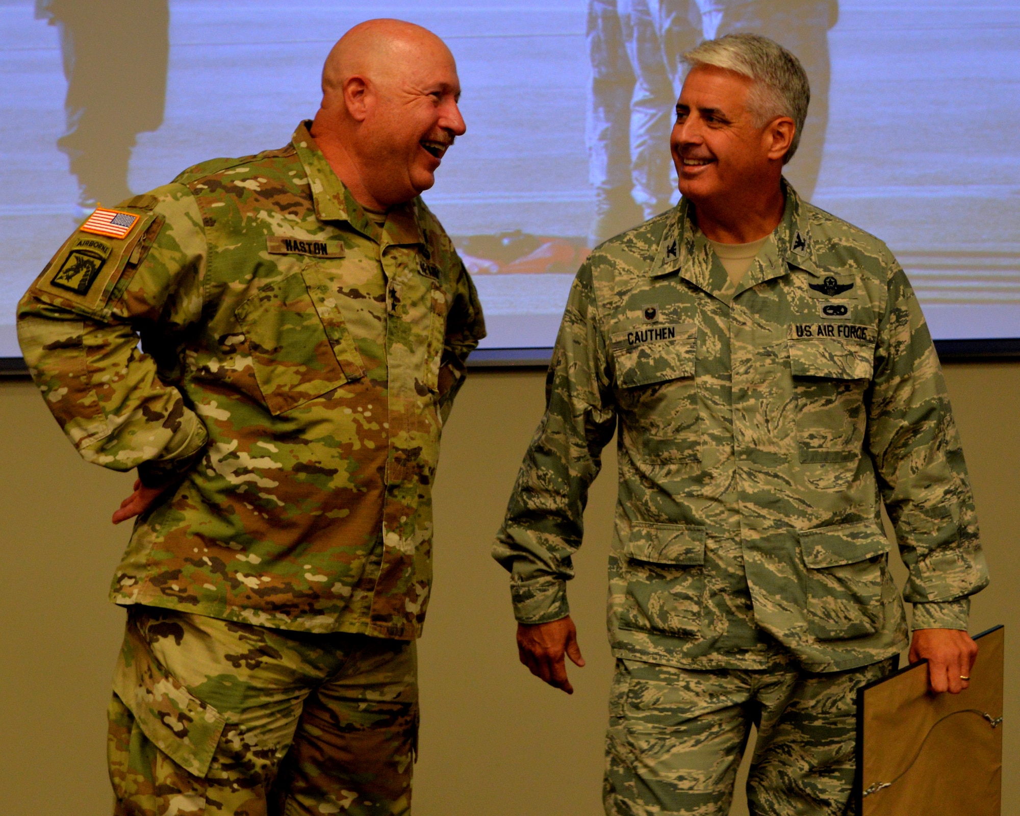 Maj. Gen. Terry M. Haston, the Adjutant General of Tennessee National Guard and Col. Thomas Cauthen, 134th Air Refueling Wing Commander talk while visiting the 134th Operations Group July 27, 2016 at McGhee Tyson ANG Base, Knoxville, Tenn. (U.S. Air National Guard photo by Staff Sgt. Daniel Gagnon)