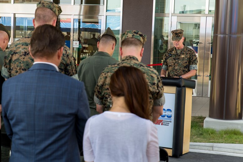 U.S. Navy Cmdr. Jeffery Logan, command chaplain with the Marine Memorial Chapel, gives an invocation during the Torii Pines Town Center grand opening ceremony at Marine Corps Air Station Iwakuni, Japan, Aug. 12, 2016. Torii Pines centralizes the temporary lodging facilities where people can get necessities within the community such as a laundromat and barbershop. Construction of the three-story, 95,000 square foot town center started March 14, 2014 and finished March 31, 2016, costing approximately $38.5 million. (U.S. Marine Corps photo by Lance Cpl. Aaron Henson)