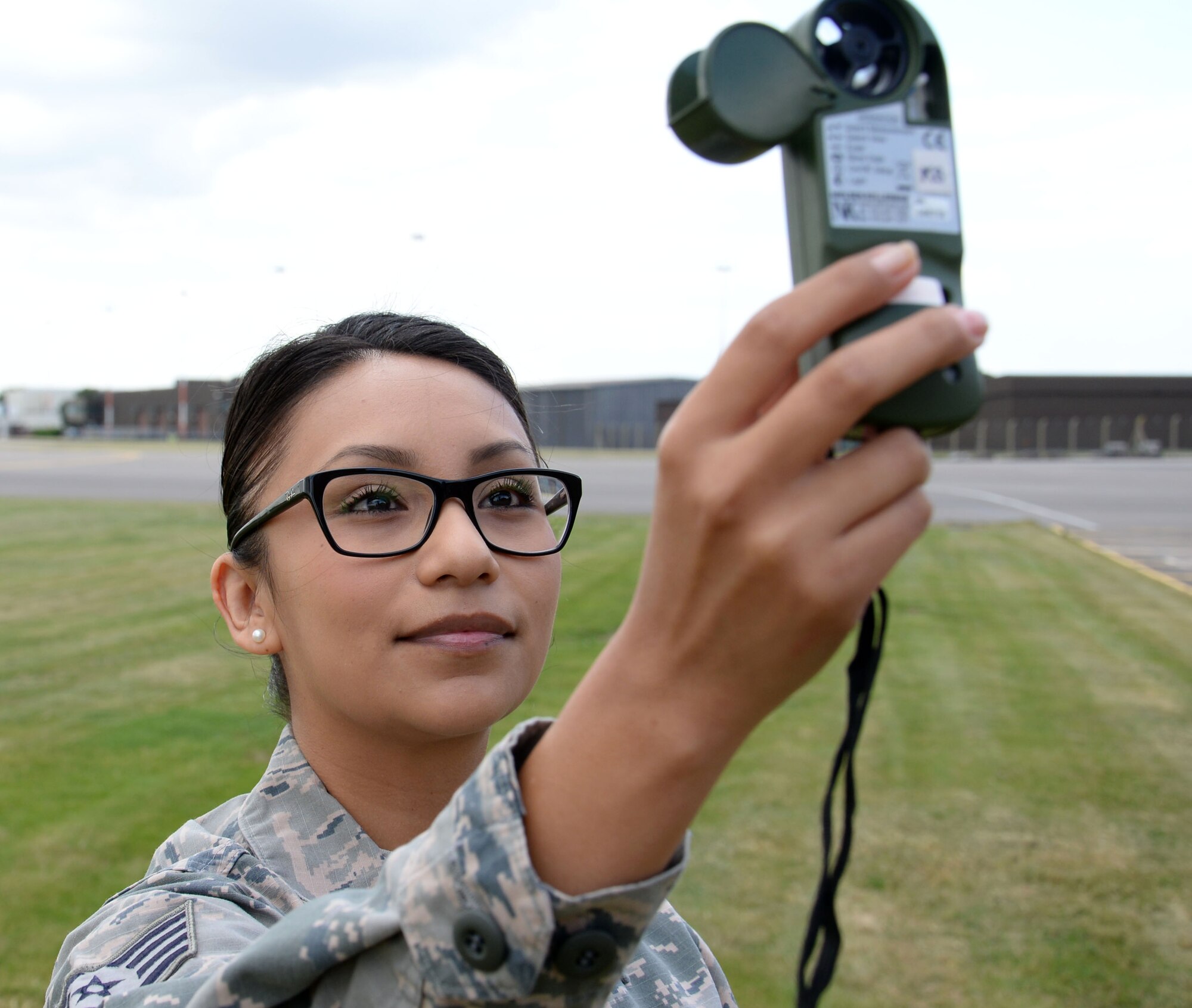 U.S. Air Force Staff. Sgt. Marissa Munguia, 100th Operations Support Squadron weather forecaster, gathers wind information to measure crosswind impacts for the airfield Aug. 8, 2016, on RAF Mildenhall, England. Information gathered is used to brief outgoing pilots. (U.S. Air Force photo by Gina Randall)