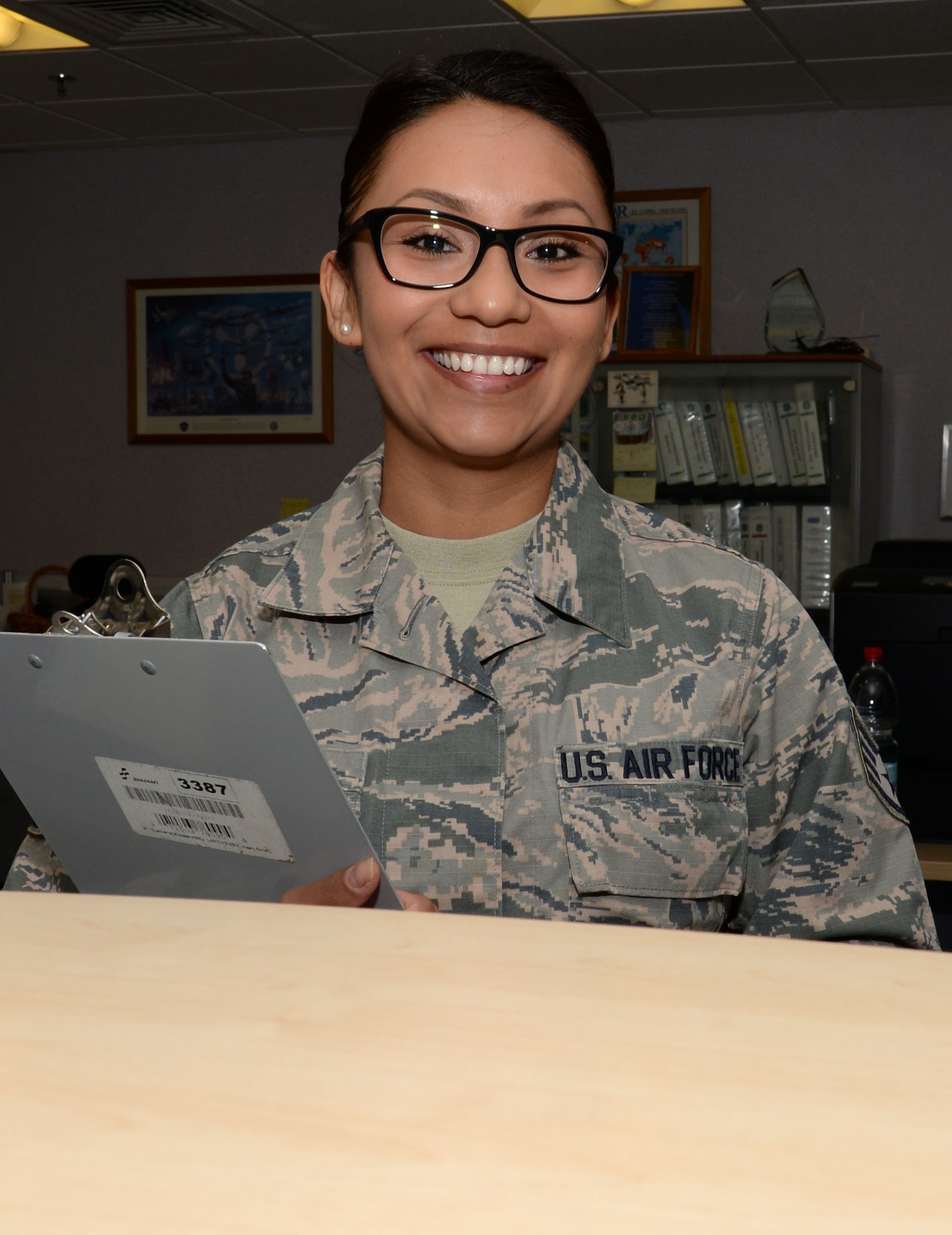 U.S. Air Force Staff. Sgt. Marissa Munguia, 100th Operations Support Squadron weather forecaster, poses for a photograph in her office Aug. 8, 2016, on RAF Mildenhall, England. Munguia was nominated for ‘The Lance P. Sijan United States Air Force Leadership Award’ due to her leadership skills and work ethic. (U.S. Air Force photo by Gina Randall)