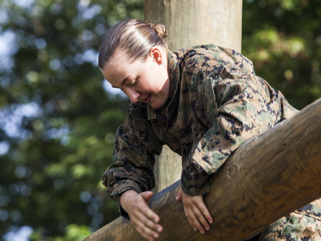 A Candidate with Charlie Company, Officer Candidate School (OCS), conducts the Confidence Course aboard Marine Corps Base Quantico, Va., July 16, 2016. The mission of OCS is to educate and train officer candidates in order to evaluate and screen individuals for qualities required for commissioning as a Marine Corps officer. (U.S. Marine Corps Combat Camera photo by Lance Cpl. Jose Villalobosrocha/Released)