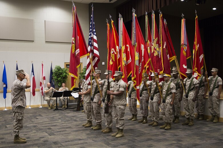 The Force Headquarters Group color guard presents the colors to Lt. Gen. Rex C. McMillian, commander of Marine Forces Reserve and Marine Forces North, during the FHG change of command ceremony at the Federal City Auditorium, New Orleans, Aug. 13, 2016. Each one of the flags represented one of the 12 commands of FHG in honor of the incoming commander Brig. Gen. Michael F. Fahey and outgoing commander Brig. Gen. Helen G. Pratt. (U.S. Marine Corps photo by Lance Cpl. Melissa Martens/ Released)