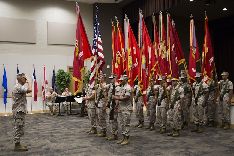 The Force Headquarters Group color guard presents the colors to Lt. Gen. Rex C. McMillian, commander of Marine Forces Reserve and Marine Forces North, during the FHG change of command ceremony at the Federal City Auditorium, New Orleans, Aug. 13, 2016. Each one of the flags represented one of the 12 commands of FHG in honor of the incoming commander Brig. Gen. Michael F. Fahey and outgoing commander Brig. Gen. Helen G. Pratt. (U.S. Marine Corps photo by Lance Cpl. Melissa Martens/ Released)