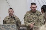 Command Sgt. Maj. Christopher Kepner, the senior enlisted leader of the Army National Guard, shakes the hands of Soldiers at the Basic Leader Course graduation August 12, 2016 at Camp Buehring, Kuwait. His remarks were part of his week-long visit to National Guard troops assigned to U.S. Army Central’s area of operations.