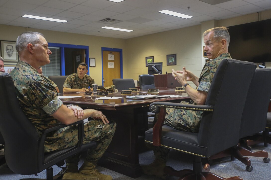 Navy Rear Adm. Stephen Pachuta, right, the Medical Officer of the Marine Corps, speaks to sailors from 2nd Medical Battalion at Camp Lejeune, N.C., Aug. 9. Pachuta visited several units across Marine Corps Installations-East, evaluating medical readiness and operational procedures throughout II Marine Expeditionary Force. (U.S. Marine Corps photo by Sgt. Lucas Hopkins)