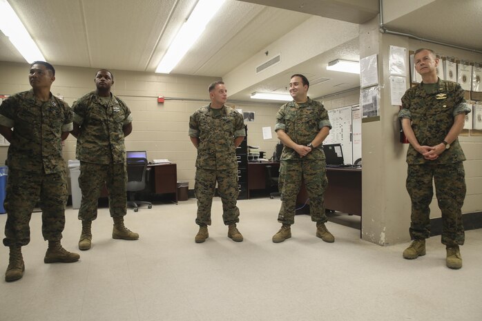Navy Rear Adm. Stephen Pachuta, right, the Medical Officer of the Marine Corps, meets with sailors from 2nd Medical Battalion at Camp Lejeune, N.C., Aug. 9. In order to evaluate and enhance medical procedures, Pachuta spoke to key leaders and engaged with junior sailors from across II Marine Expeditionary Force. (U.S. Marine Corps photo by Sgt. Lucas Hopkins)