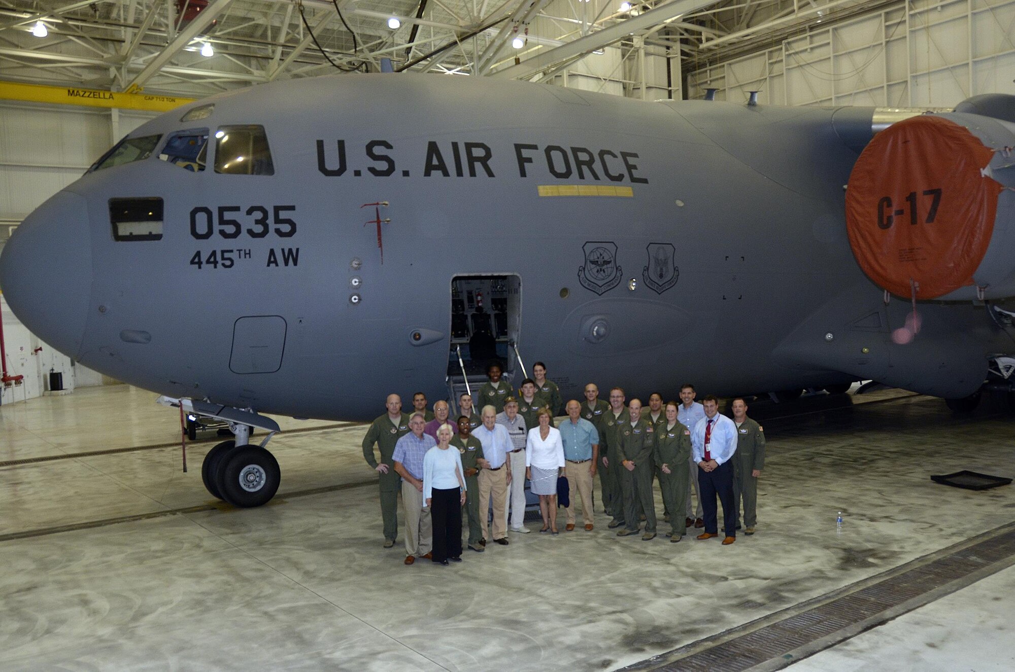 Two World War two veterans, Bob Linder and J. McGee,  their families and friends enjoyed a tour of a 445th Airlift Wing C-17 Globemaster III August 11, 2016. Airmen from the 445th Aeromedical Evacuation Squadron provided a demonstration on board the aircraft, giving the group an idea of their duties during an AE flying mission. Mr. Linder has generously supported the United Service Organizations (USO) and our wounded warriors.  (U.S. Air Force photo/Staff Sgt. Joel McCullough)