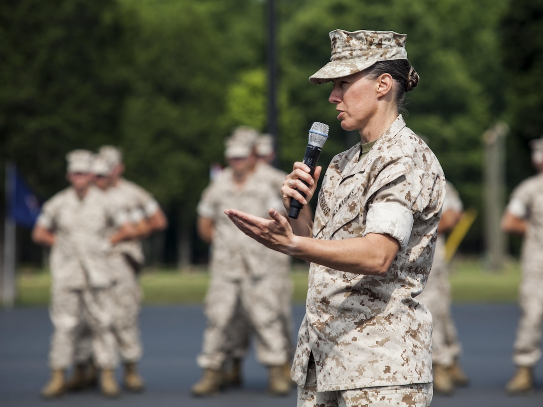 U.S. Marine Corps Col. Julie L. Nethercot, commanding officer of Officer Candidate School (OCS) addresses guests during India Company's completion ceremony aboard Marine Corps Base Quantico, Va., July 1, 2016. The mission of OCS is to educate and train officer candidates in order to evaluate and screen individuals for qualities required for commissioning as a Marine Corps officer. (U.S. Marine Corps Combat Camera photo by Lance Cpl. Jose Villalobosrocha/Released)