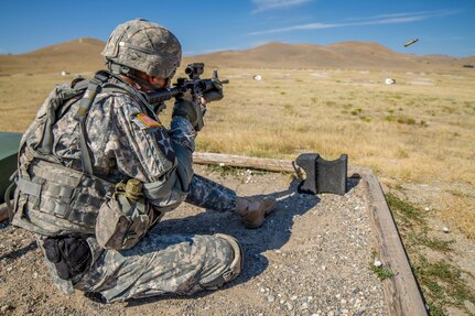 Sgt. 1st Class Joshua Moeller, 2016 U.S. Army Reserve Best Warrior Competition (BWC) winner in the noncommissioned officer (NCO) category, qualifies on an M-4 rifle at Fort Harrison, Mont., August 9, 2016. The Army Reserve BWC winners and runners up from the NCO and Soldier categories are going through rigorous training, leading up to their participation in the Department of the Army Best Warrior Competition this fall at Fort A.P., Va.