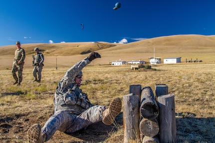 Sgt. 1st Class Robert Jones, 2016 U.S. Army Reserve Best Warrior Competition (BWC) runner up in the noncommissioned officer (NCO) category, tosses a training grenade at Fort Harrison, Mont., August 9, 2016. Army Reserve Best Warrior winners and runner-ups are preparing for their participation in  the Department of the Army Best Warrior Competition this fall at Fort A.P. Hill, Va.