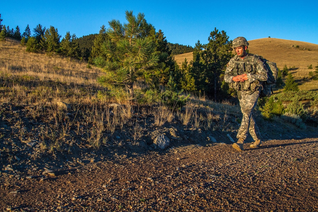 Sgt. 1st Class Robert Jones, 2016 U.S. Army Reserve Best Warrior Competition (BWC) runner up in the noncommissioned officer (NCO) category, marches on during an eight mile foot march at Fort Harrison, Mont., August 9, 2016. The Army Reserve BWC winners and runners up from the noncommissioned officer (NCO) and Soldier categories are going through rigorous training, leading up to their participation in the Department of the Army Best Warrior Competition this fall at Fort A.P., Va.