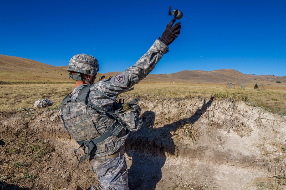 Sgt. 1st Class Robert Jones, 2016 U.S. Army Reserve Best Warrior Competition (BWC) runner up in the noncommissioned officer (NCO) category, tosses a training grenade at Fort Harrison, Mont. August 9, 2016. The Army Reserve BWC winners and runners up from the NCO and Soldier categories are going through rigorous training, leading up to their participation in the Department of the Army Best Warrior Competition this fall at Fort A.P., Va.
