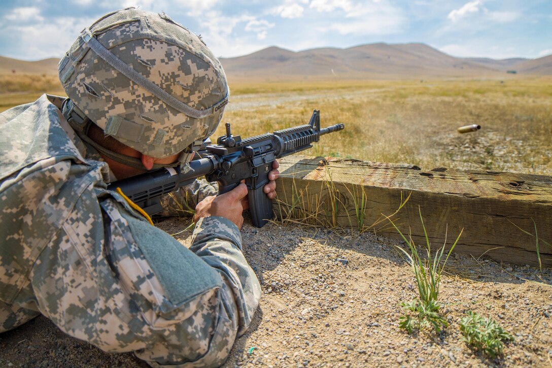 Spc. Michael S. Orozco, 2016 U.S. Army Reserve Best Warrior Competition (BWC) winner in the Soldier category, fires an M-4 rifle at Fort Harrison, Mont., August 9, 2016. The Army Reserve BWC winners and runners up from the noncommissioned officer (NCO) and Soldier categories are going through rigorous training, leading up to their participation in the Department of the Army Best Warrior Competition this fall at Fort A.P., Va.
