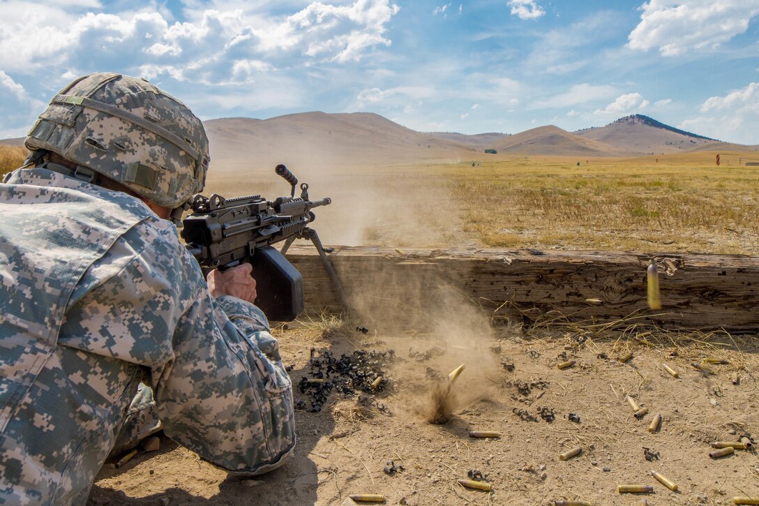 Sgt. 1st Class Robert Jones, 2016 U.S. Army Reserve Best Warrior Competition (BWC) runner up in the noncommissioined officer (NCO) category, fires a M-249 squad automatic weapon at Fort Harrison, Mont., August 8, 2016.  The Army Reserve BWC winners and runners up from the NCO and Soldier categories are going through rigorous training, leading up to their participation in the Department of the Army Best Warrior Competition this fall at Fort A.P., Va.