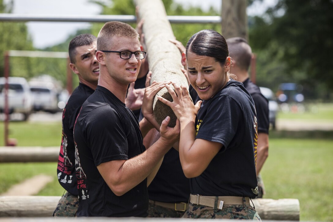 Candidates with Lima and India Company, Officer Candidate School (OCS) conduct a Field Meet aboard Marine Corps Base Quantico, Va., June 30, 2016. The mission of OCS is to educate and train officer candidates in order to evaluate and screen individuals for qualities required for commissioning as a Marine Corps officer. (U.S. Marine Corps Combat Camera photo by Lance Cpl. Jose Villalobosrocha/Released)