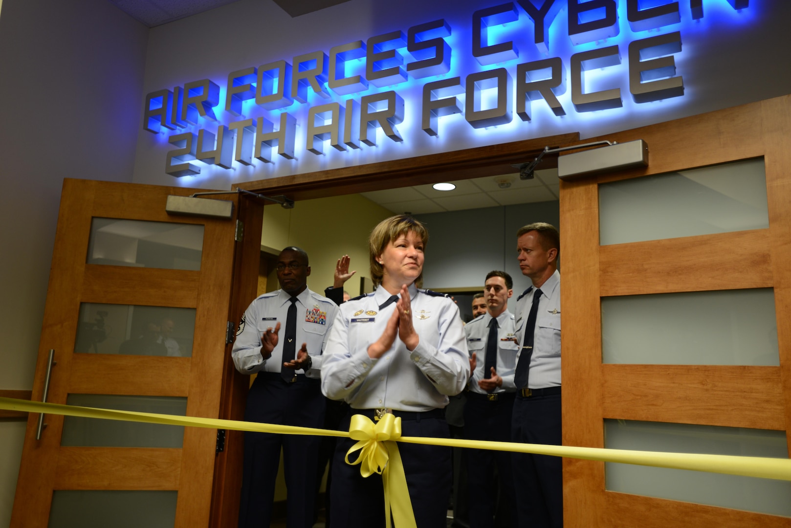 Maj. Gen. Suzanne M. Vautrinot (Ret.), 24th Air Forces’ second commander, addresses visitors and members of the media during the official ribbon cutting ceremony in the Numbered Air Forces new location at Port San Antonio, Texas Mar 2012 (Courtesy photo). 
