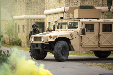 Sgt. Ebone Wills, 411th Chemical Company, Edison, N.J., exits a High Mobility Multipurpose Wheeled Vehicle during a chemical training exercise as part of a Combat Support Training Exercise at Fort McCoy, Wis., August 12, 2016. The 84th Training Command’s third and final Combat Support Training Exercise of the year hosted by the 86th Training Division at Fort McCoy, Wis. is a multi-component and joint endeavor aligned with other reserve component exercises. (U.S. Army photo by Sgt. Robert Farrell/Released)