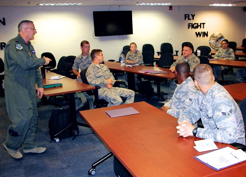 Col. Jonathan Philebaum, commander, 932nd Airlift Wing, takes questions and gives an overview of the wing's strategic plan, during the August 6 Unit Training Assembly, as he spoke to the newest additions of the 932nd AW during the Newcomers Orientation Course at Scott Air Force Base, Illinois. The two day course provides new members with valuable information about the mission of the 932nd, and they hear from various subject matter experts who help them with being productive members of team Scott. (U.S. Air Force photo by Maj. Stan Paregien)