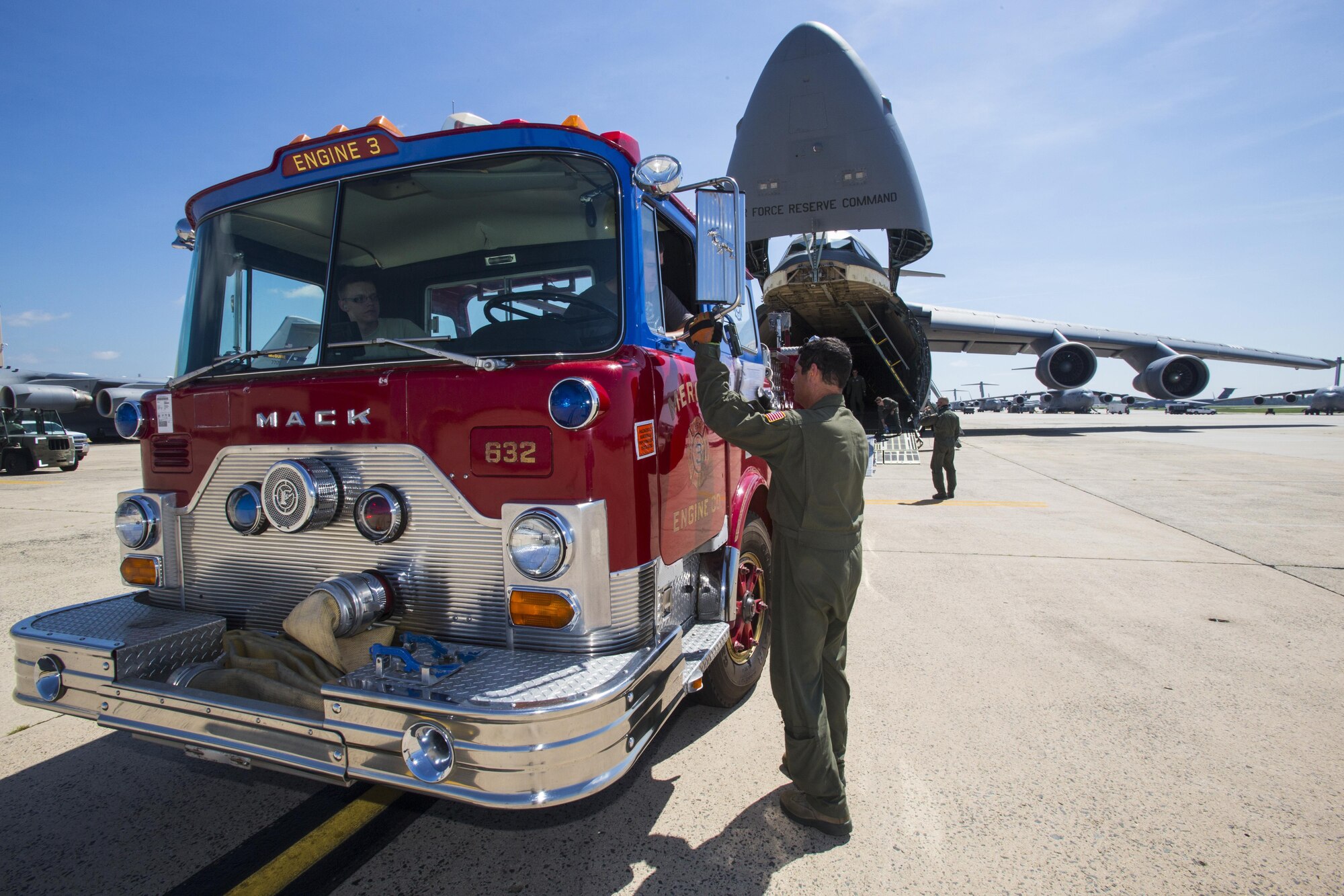 Loadmasters, with the 439th Airlift Wing, load a 1982 Mack fire truck onto a C-5B Galaxy at Joint Base McGuire-Dix-Lakehurst, New Jersey, on Aug. 12, 2016. Master Sgt. Jorge A. Narvaez, a New Jersey Air National Guardsman with the 108th Security Forces Squadron, was instrumental in getting the truck donated to a group of volunteer firefighters in Managua, Nicaragua. The truck donation is done through the Denton Program, which allows U.S. citizens and organizations to use space available on military cargo aircraft to transport humanitarian goods to countries in need. The 439th AW is located at Westover Air Reserve Base, Mass.