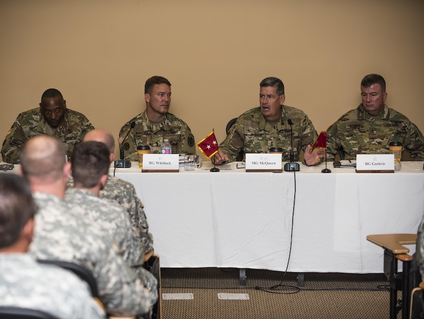 Maj. Gen. Mark McQueen, 108th Training Command (IET) commanding general, answers questions from the field during a senior leader seminar held at Joint Base Lewis McChord, Wash., Aug. 6. Sixty-seven Military Science Instructors from 150 Universities spread throughout 26 states were present during the seminar as part of an annual training development event designed to tap into senior leader mentoring and motivational techniques as well as provide a forum for the exchange of ideas and best practices. The event was hosted by the 104th Training Division's 4th Battalion, 414th Regiment (SROTC). (U.S. Army Reserve photo by Sgt. 1st Class Brian Hamilton)