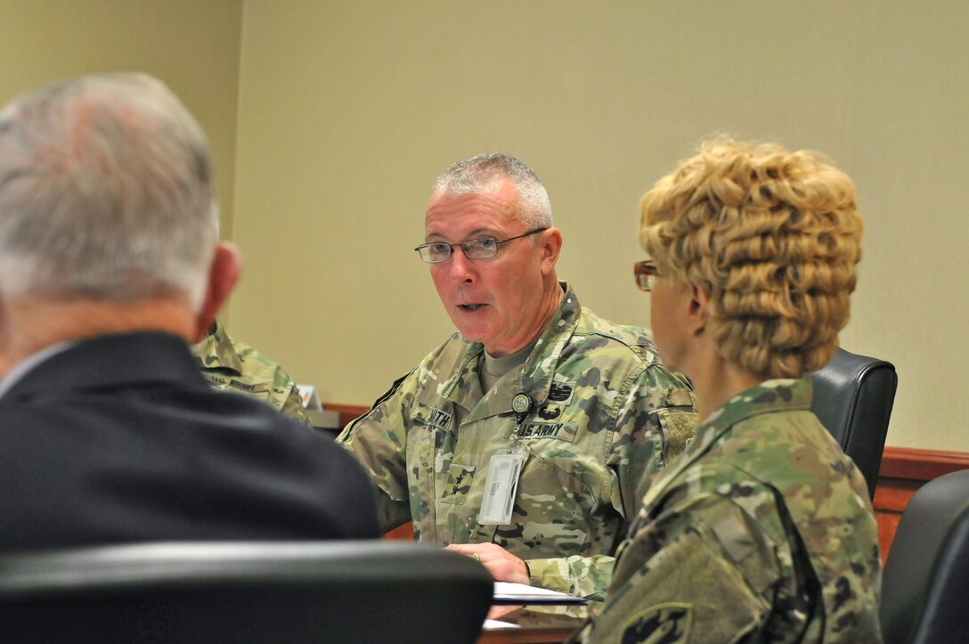 Maj. Gen. Michael Smith (center), deputy chief, U.S. Army Reserve, briefs Army Reserve Ambassadors (ARA) from the 63rd Regional Support Command, as part of an ARA Training Forum for the ambassadors, Aug. 12, Armed Forces Reserve Center, Mountain View, Calif. Smith concentrated on readiness as the most critical factor facing the Army Reserve and outlined the strategic goals of the reserve over the next few years. To Smith's left is Chief Warrant Officer 5 Belynda Lindsey, command chief warrant officer, 63rd RSC. (U.S. Army Reserve Photo by Capt. Alun Thomas)